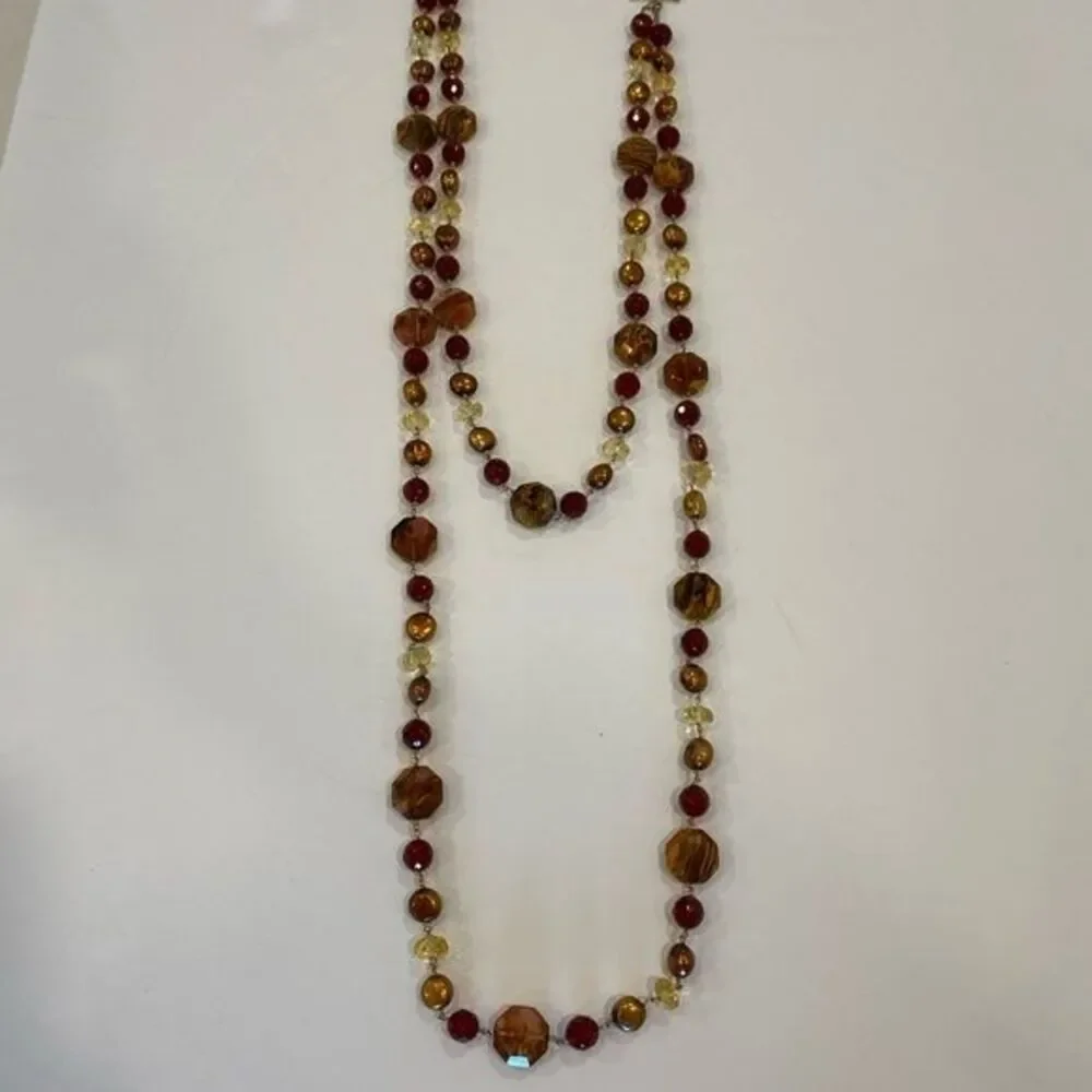 Double strand necklace Unique blend of beads and pearls. Toggle closure